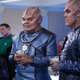 This image from the season two premiere shows Klyden, Bortus, and...could that be their son?
